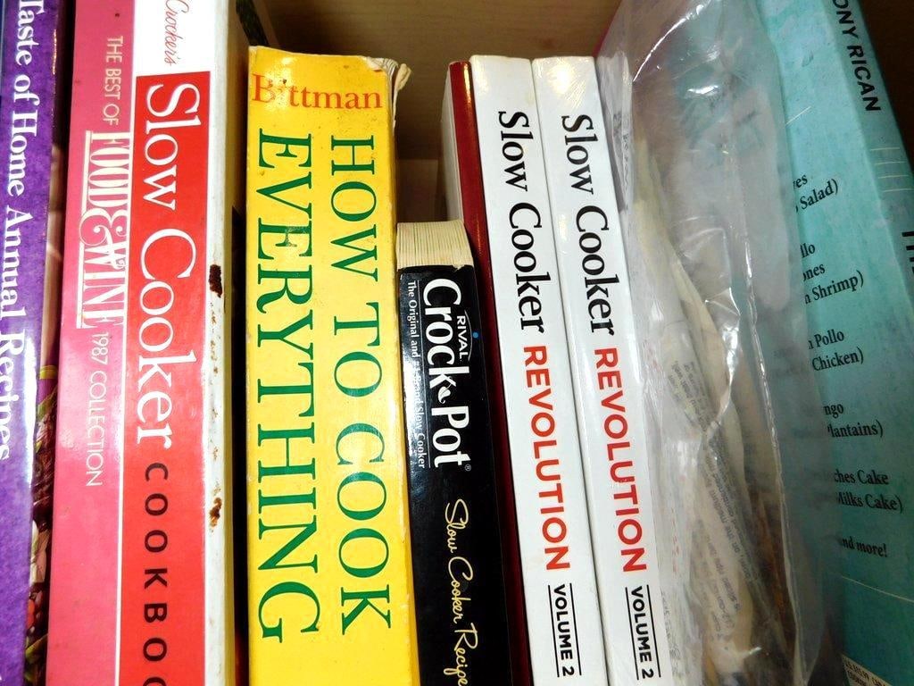 Grouping of Glass Vases and Cooking Books - 10