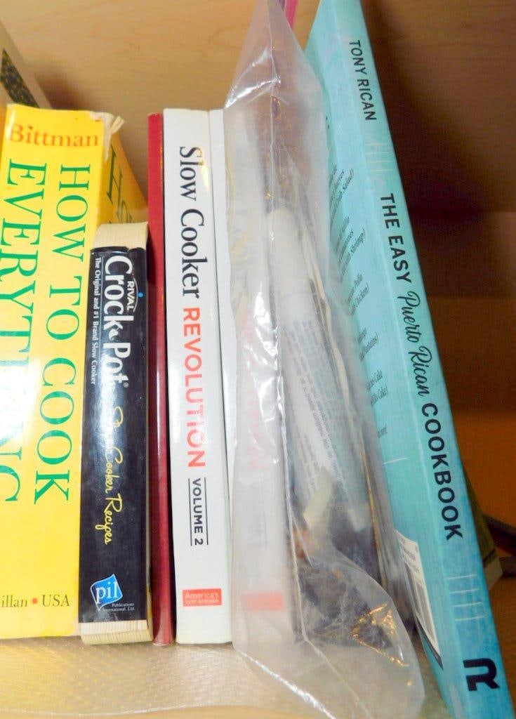 Grouping of Glass Vases and Cooking Books - 9