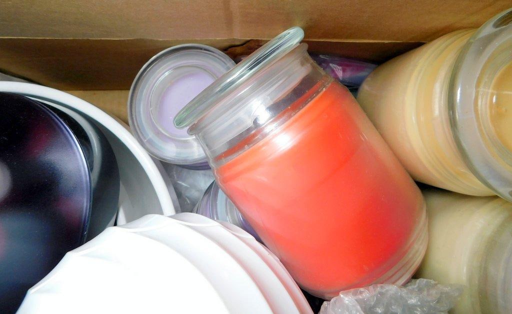 Household Items Including Mixing Bowls, Dumbbells, and Candles - 8