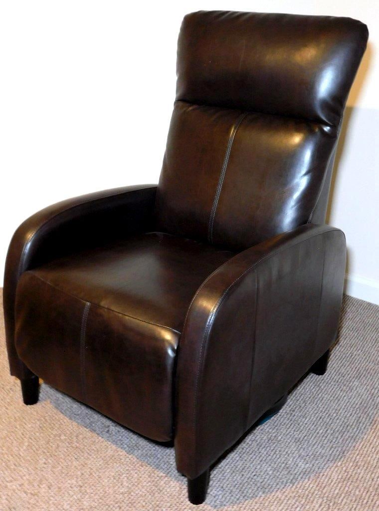 Brown Leather Recliner Chair w/ Padded Backrest: Brown leather recliner chair featuring a padded backrest Upholstered in smooth leather Equipped with wide armrests and a cushioned seat for comfort In good condition with minor creases and wear