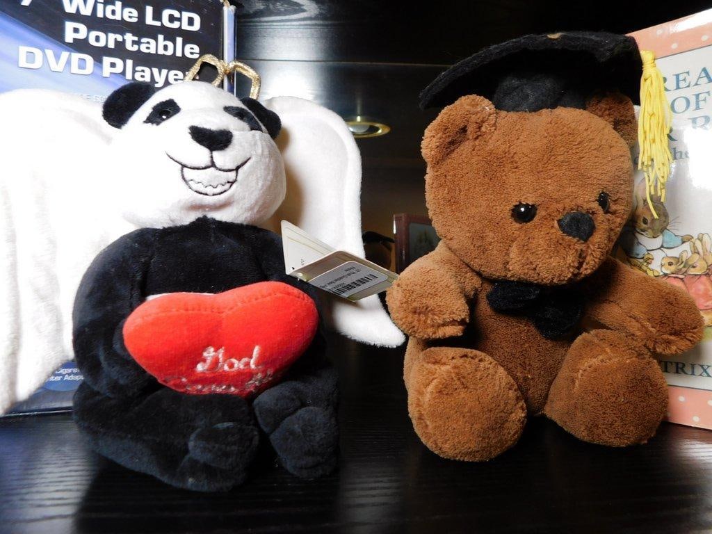 Items Including Haier Portable DVD Player, Plush Toys, and Home Decor - 4