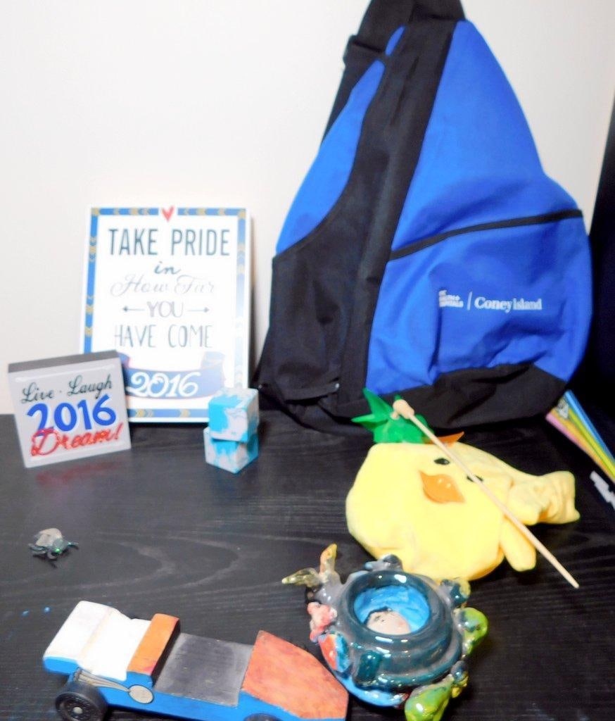 Items Including Haier Portable DVD Player, Plush Toys, and Home Decor - 7