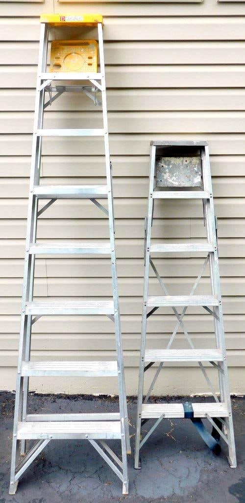Two Aluminum Step Ladders: Davidson 8-Foot Type II and Another Unbranded Model: Includes two aluminum step ladders The first is a Davidson 428-08 commercial-use Type II step ladder with an 8-foot length, a duty rating of 225 lbs, and a highest standing level at 5 ft 9 in It is