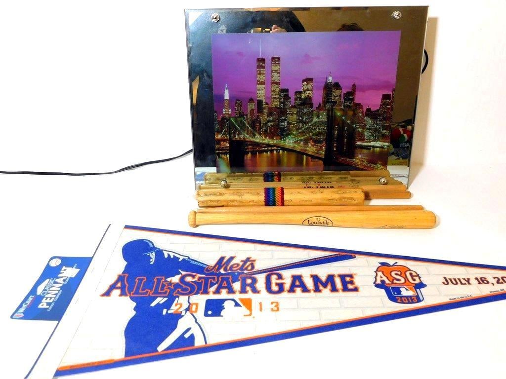New York Mets 2013 All-Star Game Pennant w/ Vic Firth Drumsticks and Skyline Photo Display: A New York Mets 2013 All-Star Game pennant by WinCraft, marked as Made in the U.S.A., and commemorating the event held on July 16, 2013 Accompanied by three drumsticks, two marked Vic Firth and one ma