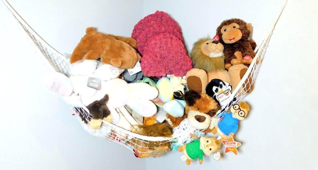 Plush Toys, Including Licensed Alvin and the Chipmunks Figures: Various plush toys in a white hanging net Includes licensed characters, such as Simon and Theodore from Alvin and the Chipmunks, as well as an assortment of animals like lions, monkeys, and dogs One