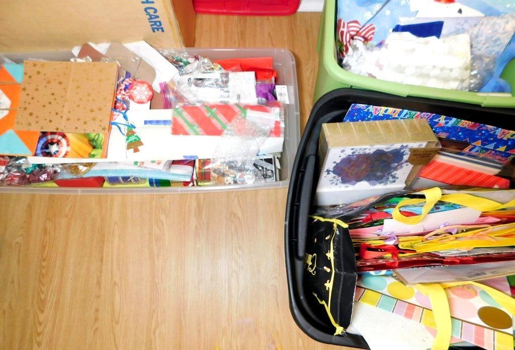 Holiday Gift Bags, Wrapping Paper, and Stationery Lot: Large assortment of holiday-themed gift bags, wrapping paper, ribbons, and stationery Includes wonderful gift bags, rolls of wrapping paper with festive designs, seasonal gift bags, holiday cards,