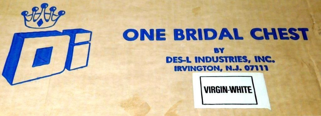 Des-L Industries Virgin-White Bridal Gown in Chest, Sealed Packaging: Bridal gown in original bridal chest by Des-L Industries, Inc., based in Irvington, NJ The packaging indicates a Virgin-White bridal gown, sealed with tape separation shown Gown was worn once