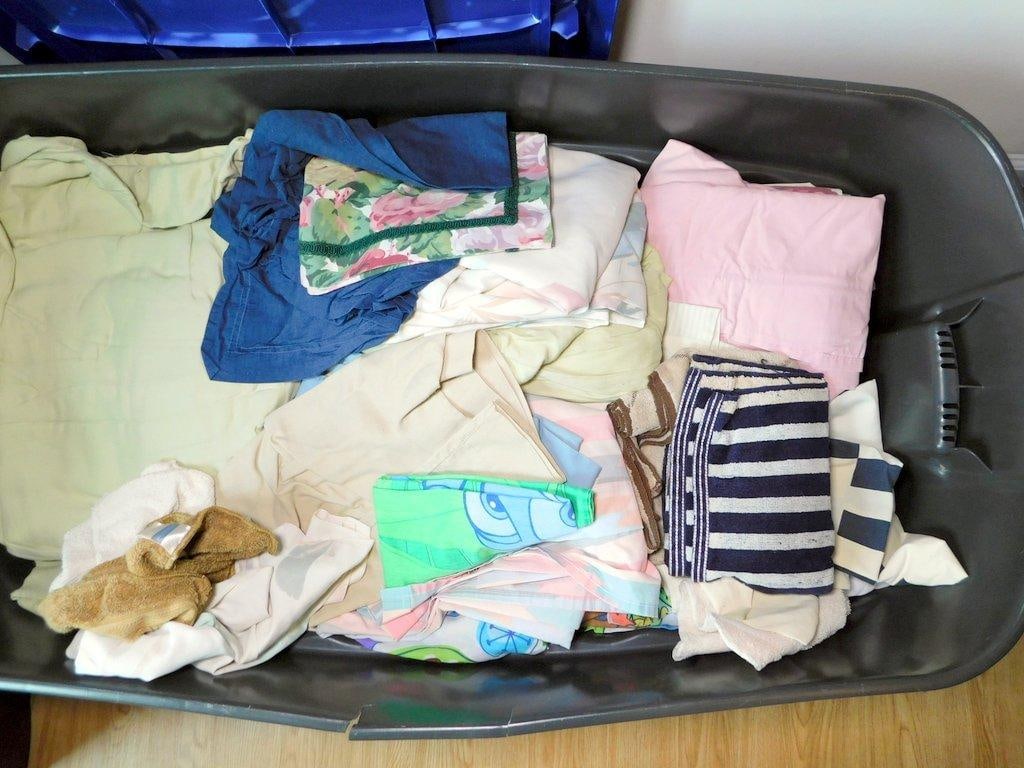 Two Large Plastic Storage Totes w/ Assorted Linens - 4