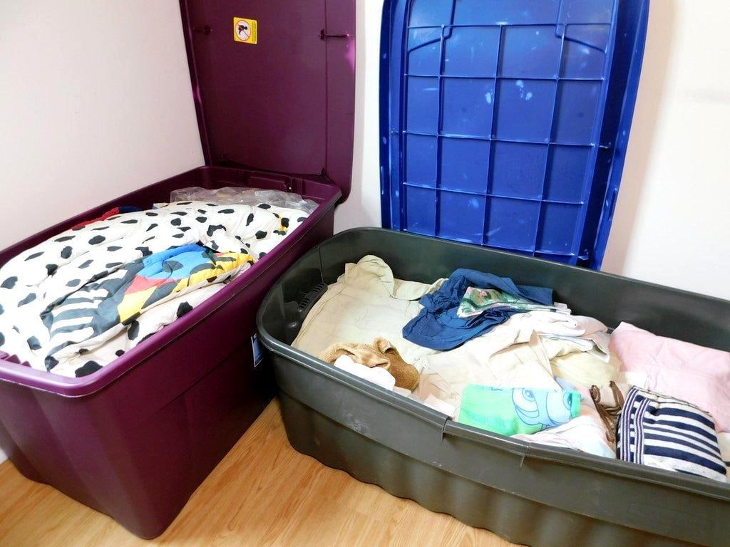 Two Large Plastic Storage Totes w/ Assorted Linens - 7