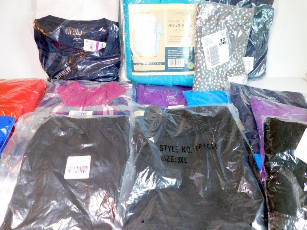Apparel and Textiles in Various Sizes and Brands: Lot featuring new and packaged clothing and textiles Items include apparel from brands like Alfani and Just My Size with sizes ranging from 1X to 3X, and various material blends including polyester