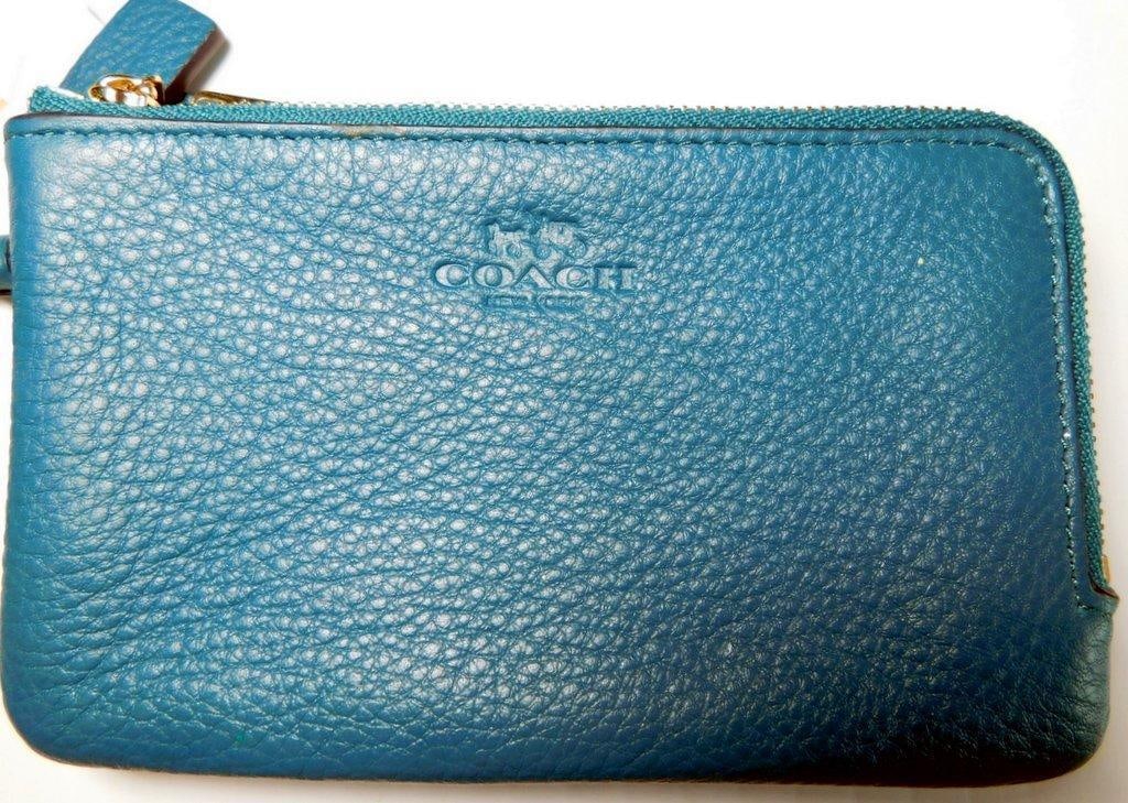 Coach F66505 IM/Atlantic Leather Zip Coin Pouch, w/ Tags: Coach F66505 leather zip coin pouch in Atlantic blue color Crafted from pebbled leather, it features the Coach logo and a zip closure Includes an attached keyring and original Coach tag Compact and