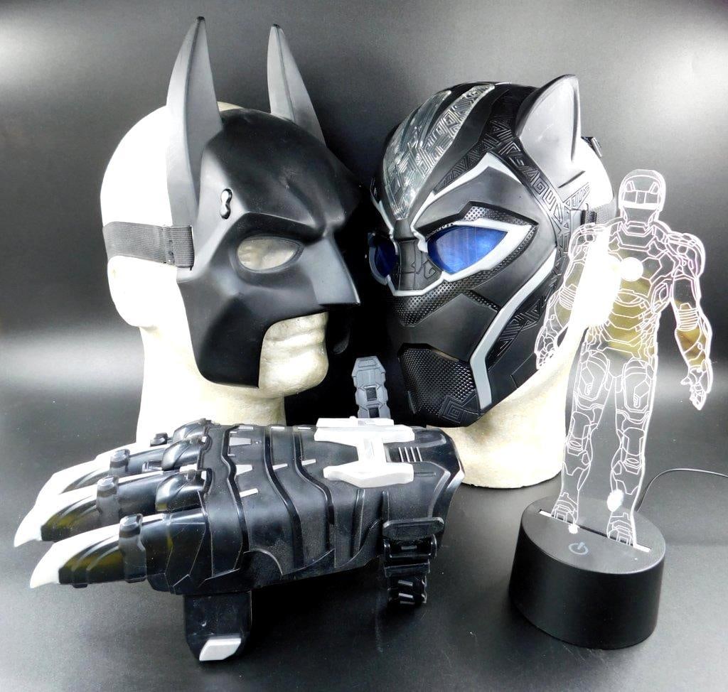 (For of 3) Black Panther light up mask, Batman mask and Power Moves Black Panther Claw- Pre-owned: (For of 3) Black Panther light up mask, Batman mask and Nerf Power Moves Black Panther Claw Black Panther has an electronic feature that lights up Pre-owned Batman Mask- Split nose version,
