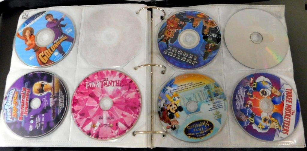 Binder of Loose DVDs -Comedy, Action, Children's Movie Collection & Empty DVD Cases - 7