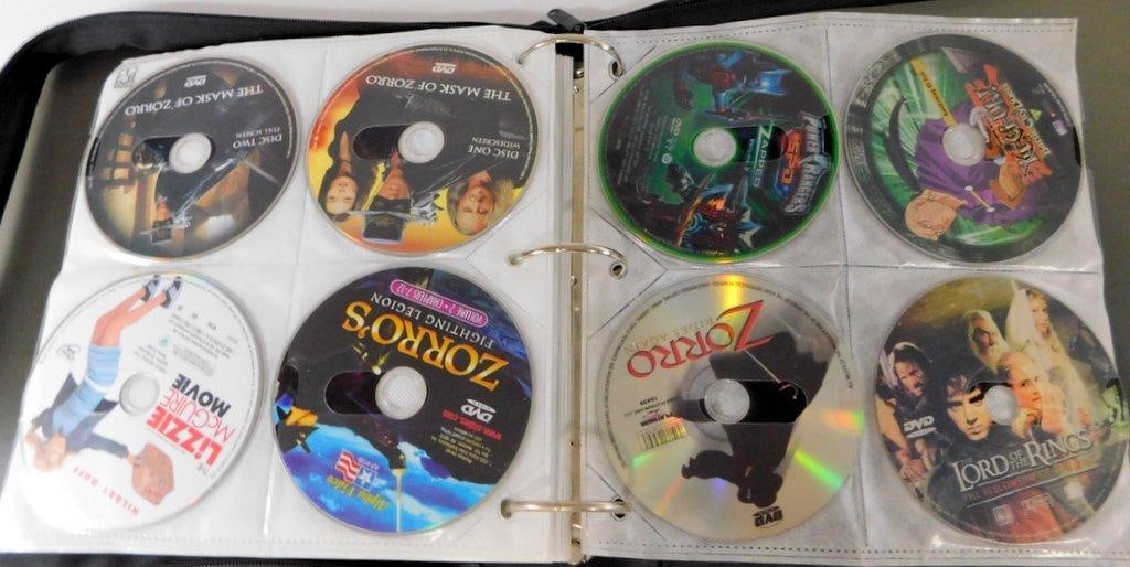 Binder of Loose DVDs -Comedy, Action, Children's Movie Collection & Empty DVD Cases - 8