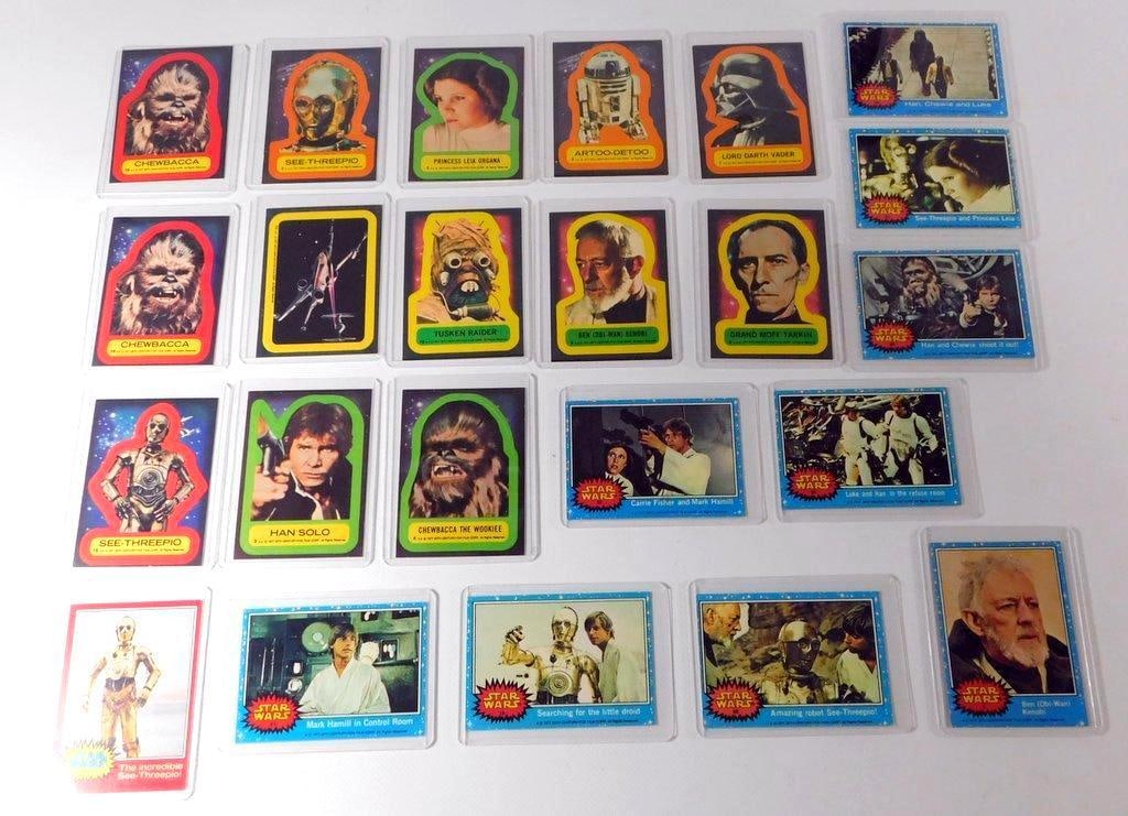 (Lot of 21) Collection of 1977 Topps Star Wars Trading Cards: (Lot of 21) Collection of 1977 Topps Star Wars trading cards Group includes a mix of different subsets and colored border expansions from the original 1977 Topps line