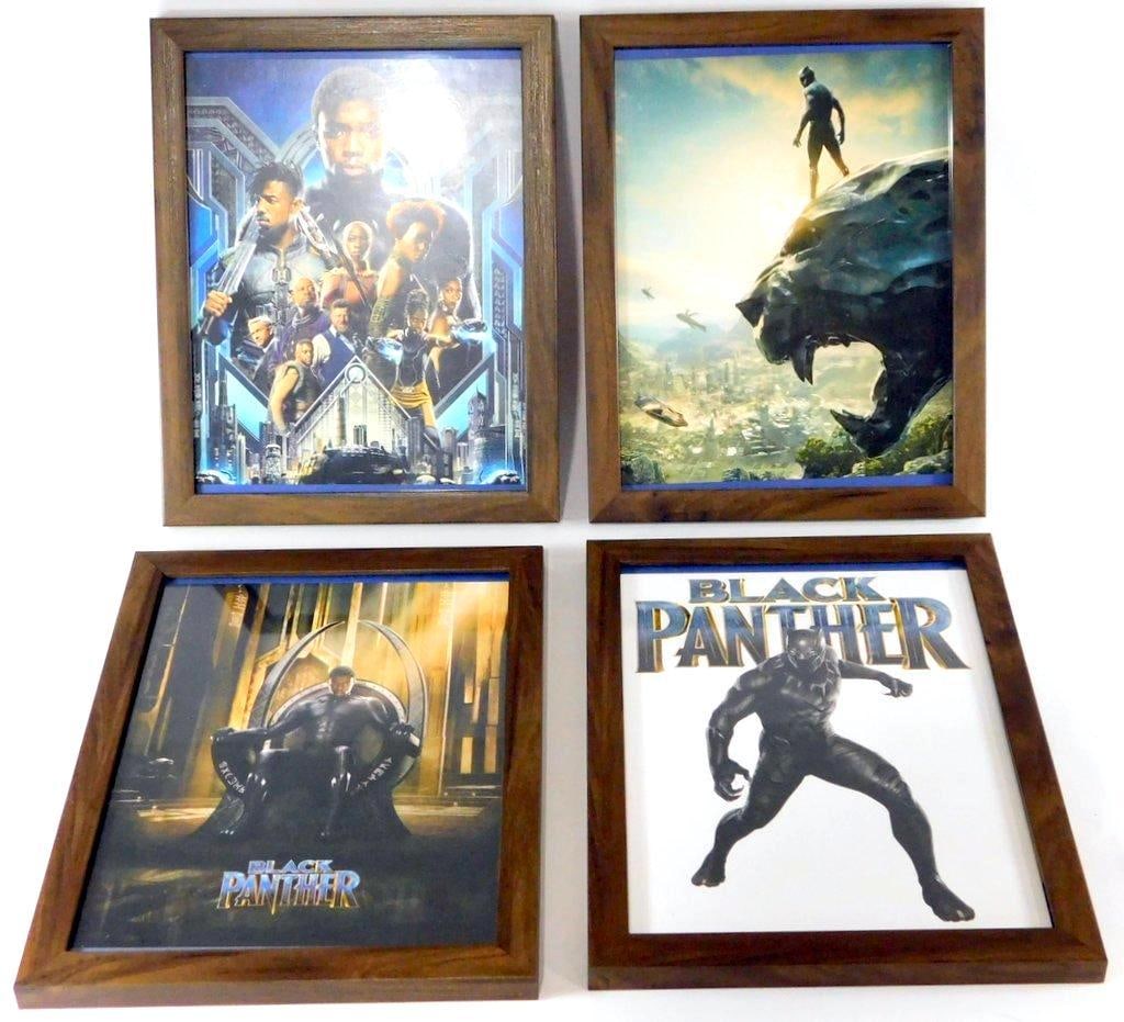 (Lot of 4) Framed Marvel's Black Panther Wall Prints: (Lot of 4) Framed Marvel's Black Panther wall prints The collection includes a movie poster featuring the main cast, a dramatic shot of Black Panther standing atop the panther monument, a scene of