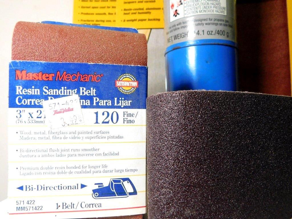 Workshop Tools and Supplies Including Sandpaper, Propane Canister, and Toolbox - 4