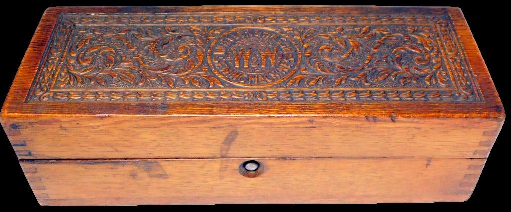 Wheeler & Wilson Manufacturing Co. Antique, Hand-Carved Wooden Accessory Box: In very good+ condition as shown Features intricate, relief-carved floral and leaf scrollwork on the lid with a central circular medallion displaying the manufacturers W&W monogram Late 19th