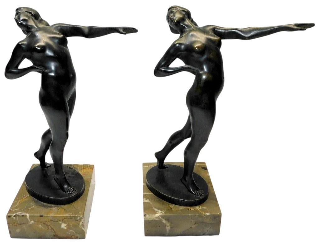 Bronze Nude Female Sculptures on Marble Bases: Wonderful classic statues Bronze sculptures depicting nude female figures, each posed dynamically with an outstretched arm Mounted on rectangular marble bases, the sculptures demonstrate fine