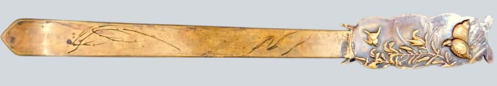 Meiji-Era (18681912) Japanese Mixed-Metal (Shakudo and Bronze) Page Turner and Letter Opener: Wonderful estate find featuring high-relief bronze or brass repousse work depicting an oni (Japanese Horned Demon/Goblin) dressed in monk's robes, holding a small hanging temple gong (kane) and strike