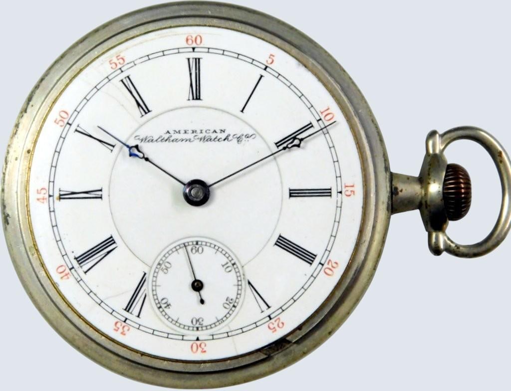 American Waltham Pocket Watch, Model 1883: Ran 12 hours before stopping on light wind American Waltham Watch Co pocket watch featuring Roman numeral markers, minute increments, and a subsidiary seconds dial The dial features black Roman numera
