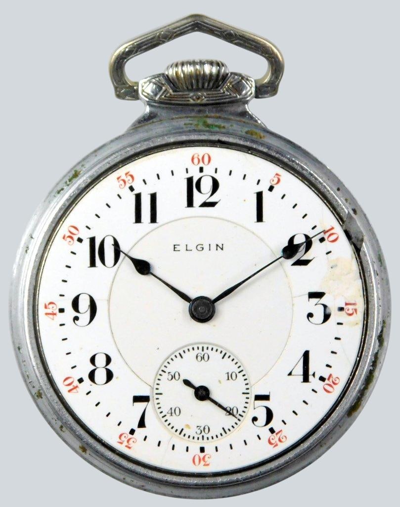 Elgin Pocket Watch w/ 23-Jewel Movement: Elgin pocket watch with a white enamel dial featuring black Arabic numerals and red minute markers The watch has a 15-jewel movement marked New York Standard Watch Co., USA. Housed in a Star Watch Cas