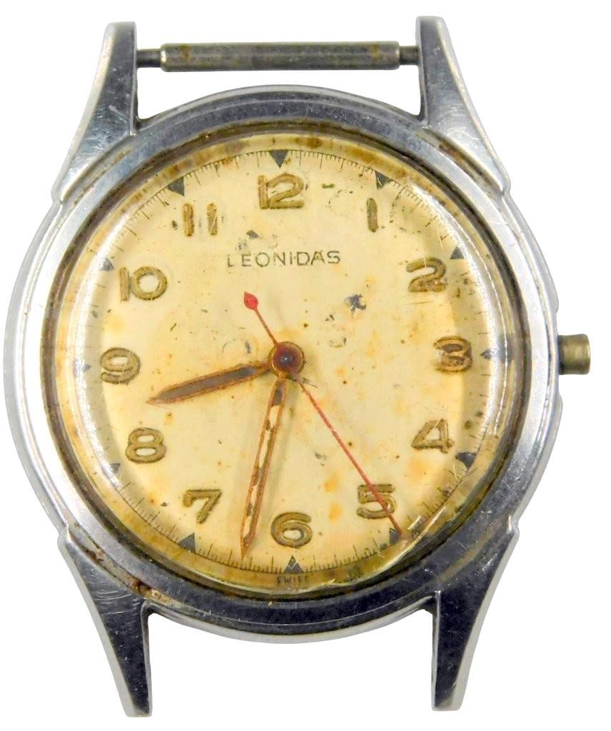 Leonidas Men's Military Swiss-Made Antimagnetic Stainless Steel Wristwatch: Leonidas men's wristwatch, featuring a Swiss-made stainless steel antimagnetic case Pre Heuer watch Markings on the back note Waterproof, Incabloc, and serial number 885035 The dial has golden