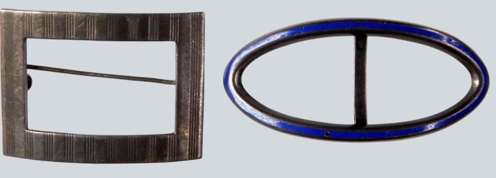 Sterling Silver Brooch and Buckle Grouping: This lot has one broach marked STERLING 4687 and the other is a small buckle or hair accessory inscribed B.B.&I SILVER The rectangular buckle features a striped design with a pin