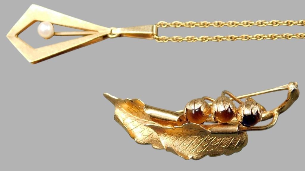 14K Gold-Filled Wells Brooch & Pendant Necklace with Pearl Accent: A 14K gold-filled brooch by Wells featuring leaf and berry designs, and a 12K Gold-Filled pendant necklace with a geometric design and pearl accent Brooch is stamped Wells, 14K G.F. indicating