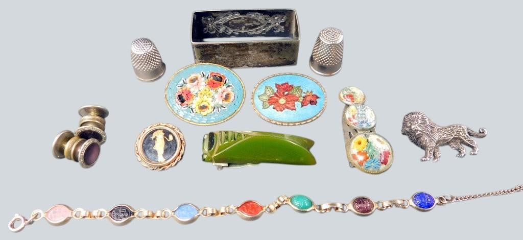 Jewelry and Decorative Items Including Scarab Bracelet, Brooches, and Thimbles: Lot featuring various jewelry and decorative items including a gold-tone scarab bracelet with multi-colored carved stones, a gold-framed brooch with a painted figure, two floral micromosaic brooches,