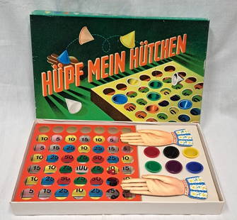 Altes Spiel Hüpf mein Hütchen: Altes Hütchenspiel "Hüpf mein Hütchen" in Original-Schachtel incl. zwei Schleudern i.Form einer Hand, sechs Hütchen, guter Vintagezustand Interne Nr. A0171400181