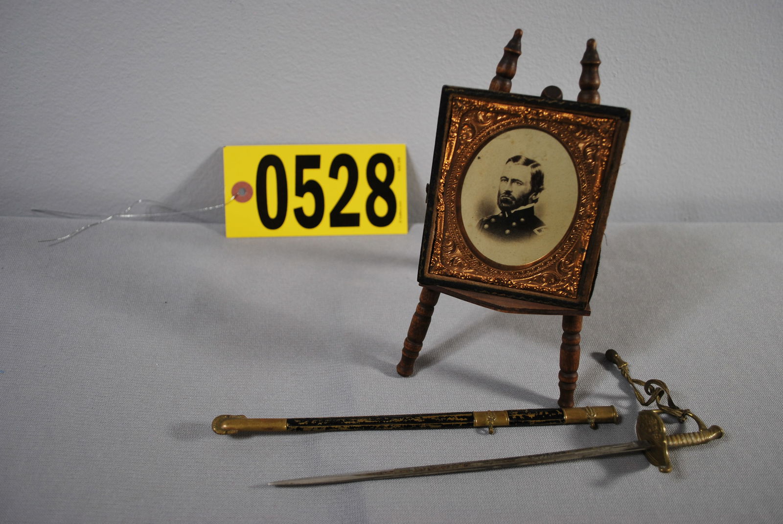 US Grant photo and letter opener: period CDV photo engraving of US Grant in photo half case, miniature sword and scabbard letter opener