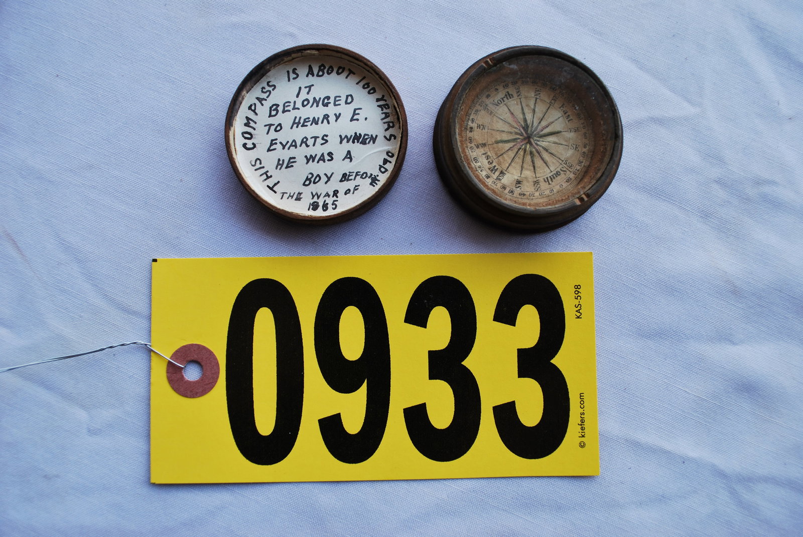 Pre-war compass in a wooden case: Compass attributed to H. E. Everts, Company C 174th Ohio Infantry. Reference material with copies of service records.