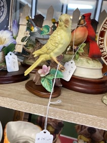 Yellow Bird with Flower