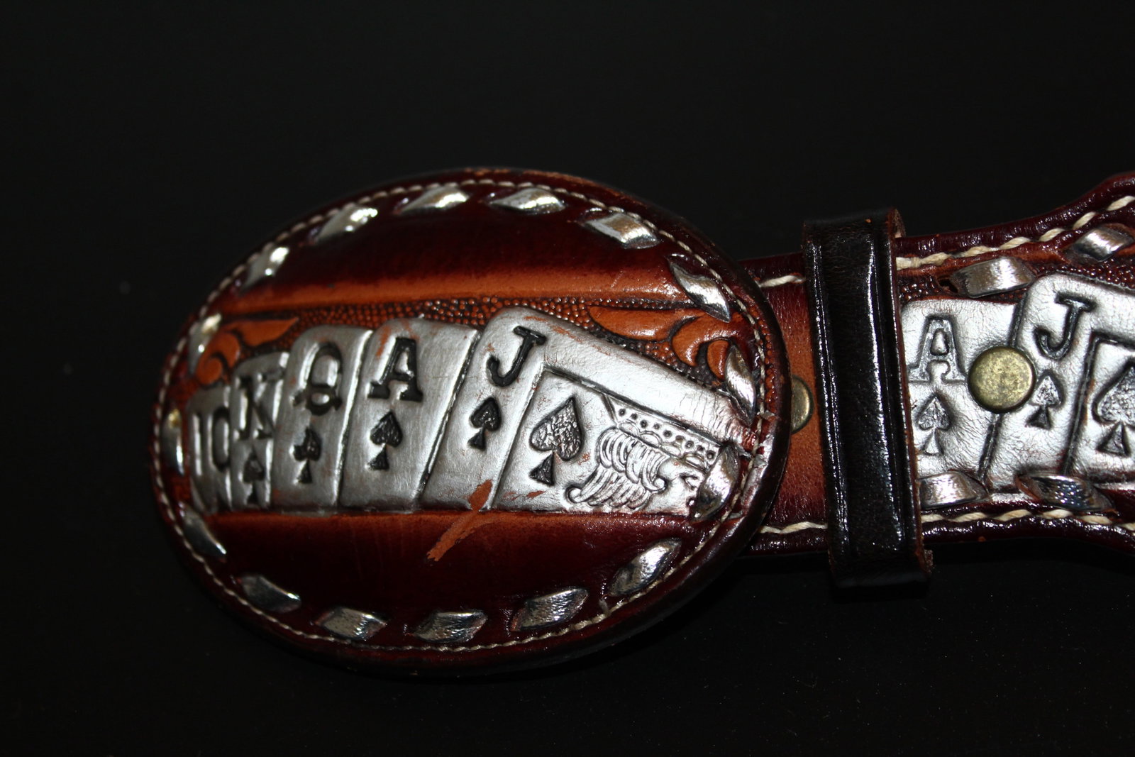 Brazos Joe Belts Poker Leather Belt SIZE 30: Poker anyone? This belt needs to be included in your next game and not in the pot! Genuine leather belt. Hand stamped with everything you need for a winning hand. Size 30 and made by Brazos Joe Belts.