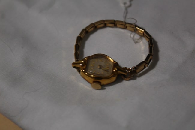 Small Wrist Gold Watch: If you have a little one they can accessorize with this gold baby watch. It has an elastic stretch to fit different tiny sized wrists comfortably.
