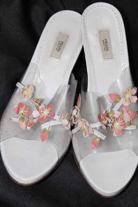 Vintage Prada Heels SIZE 38: Super cool vintage Prada heels, size 38. The tops are clear and see through plastic with dainty 3-D floral detailing, and the heels are made of silver metal w/small flowers on the back right above the