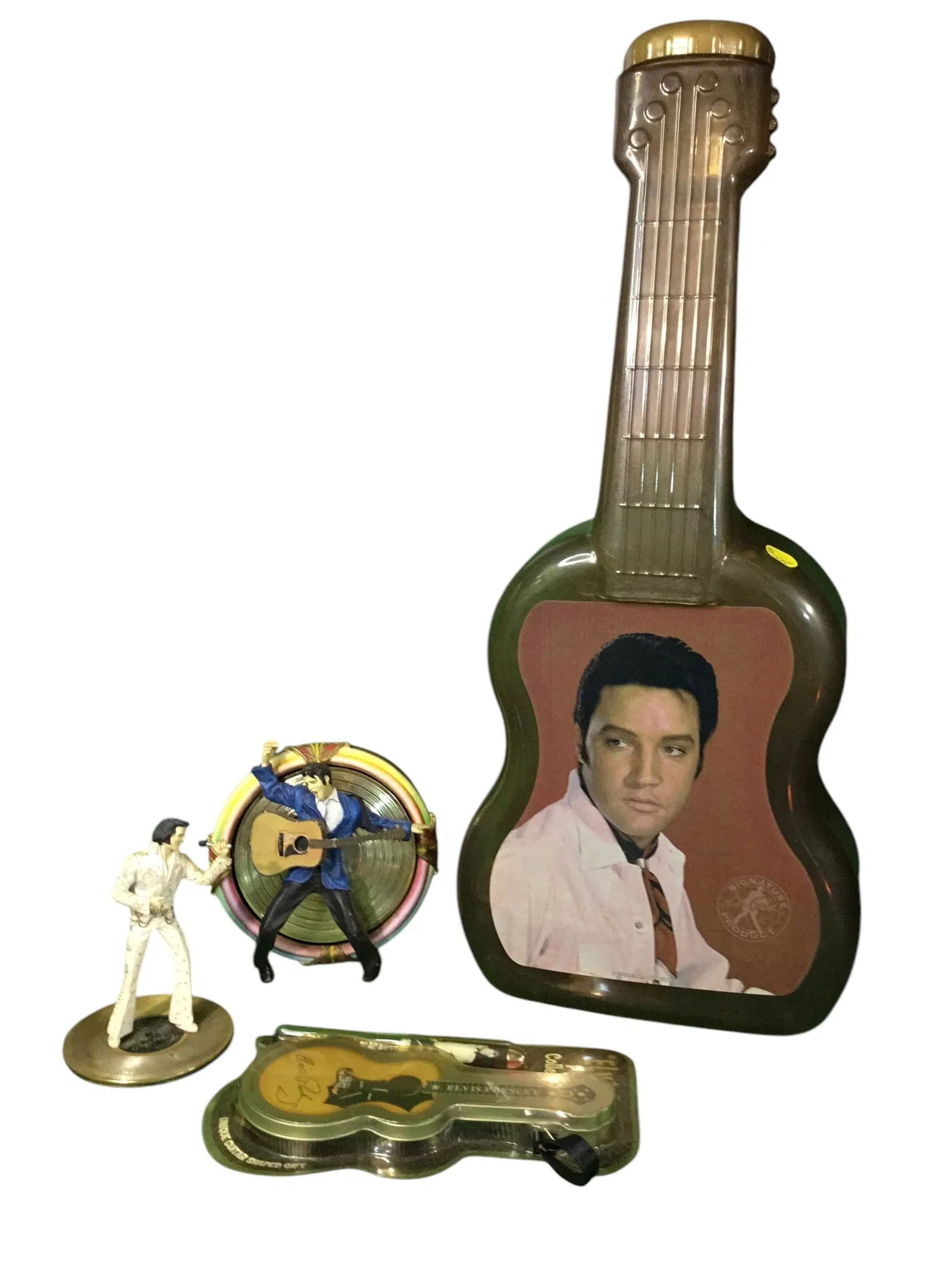 LOT OF 4 Vintage Elvis Presley Collectibles: Lot of 4 Elvis Presley collectibles. Includes 2 figurines, 1 pen, and plastic guitar. All are in good-great condition with some wear consistent with age.