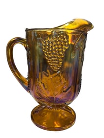 Indiana Carnival Glass Harvest Grape Footed Pitcher in Marigold