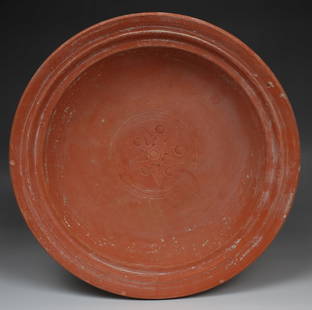 Roman plate with vegetal decoration: ITEM: Plate with vegetal decoration MATERIAL: Pottery CULTURE: Roman, North Africa PERIOD: 3rd - 5th Century A.D DIMENSIONS: 63 mm x 298 mm diameter CONDITION: Good condition PROVENANCE: Ex French