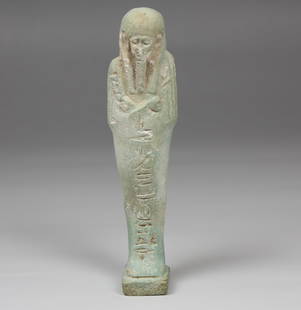 Egyptian shabti for Psamtekhen born to Nit-iy-et: ITEM: Shabti for Psamtekhen born to Nit-iy-et, back side with the formula 'O thou shabti, if you are called to perform any work in...' MATERIAL: Faience CULTURE: Egyptian PERIOD: Late period, 664 -