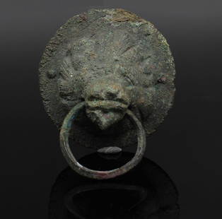 Roman lion applique: ITEM: Lion applique MATERIAL: Bronze CULTURE: Roman PERIOD: 1st – 3rd Century A.D DIMENSIONS: 52 mm diameter CONDITION: Good condition PROVENANCE: Ex Jerusalem private collection, R.J., with