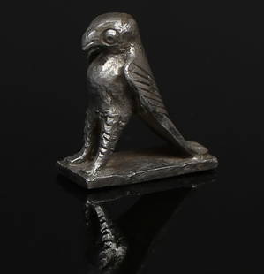 Roman statuette of an eagle: ITEM: Statuette of an eagle MATERIAL: Silver CULTURE: Roman PERIOD: 1st Century B.C - 1st Century A.D DIMENSIONS: 21 mm x 8 mm x 18 mm CONDITION: Good condition PROVENANCE: Ex Dutch private