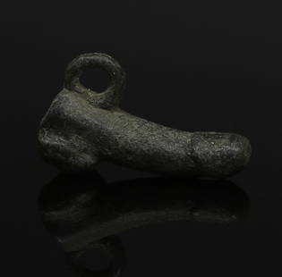 Roman phallic amulet: ITEM: Phallic amulet MATERIAL: Bronze CULTURE: Roman PERIOD: 1st - 3rd Century A.D DIMENSIONS: 15 mm x 7 mm x 25 mm CONDITION: Good condition PROVENANCE: Ex Spanish private collection, bought in