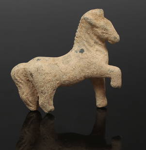 Roman statuette of a horse: ITEM: Statuette of a horse MATERIAL: Bronze CULTURE: Roman PERIOD: 1st - 3rd Century A.D DIMENSIONS: 40 mm x 41 mm CONDITION: Good condition PROVENANCE: Ex English private collection, acquired