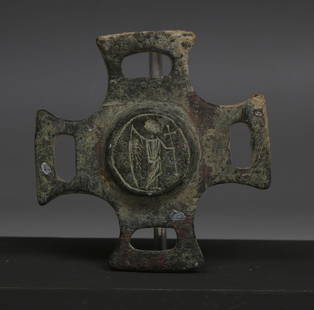 Byzantine horse harness fitting depicting saint with cross: ITEM: Horse harness fitting depicting saint with cross MATERIAL: Bronze CULTURE: Byzantine PERIOD: 5th - 7th Century A.D DIMENSIONS: 68 mm x 66 mm CONDITION: Good condition PROVENANCE: Ex Austrian