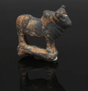 Roman statuette of a bull: ITEM: Statuette of a bull MATERIAL: Bronze CULTURE: Roman PERIOD: 1st - 3rd Century A.D DIMENSIONS: 35 mm x 35 mm CONDITION: Good condition PROVENANCE: Ex English private collection, acquired between
