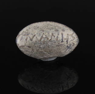 Greek sling bullet with inscription 'MANES / EYAR and MANES / PANTAR': ITEM: Sling bullet with inscription 'MANES / EYAR and MANES / PANTAR' MATERIAL: Lead CULTURE: Greek, Thrace and Turkey PERIOD: 4th Century B.C DIMENSIONS: 15 mm x 26 mm CONDITION: Good condition