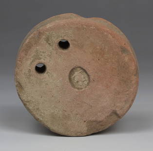 Greek weight loom with mark depicting a head: ITEM: Weight loom with mark depicting a head MATERIAL: Pottery CULTURE: Greek PERIOD: 3rd - 1st Century B.C DIMENSIONS: 20 mm x 67 mm diameter CONDITION: Good condition PROVENANCE: Ex French private