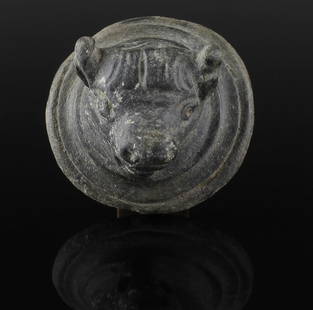 Roman bull head applique: ITEM: Bull head applique MATERIAL: Bronze CULTURE: Roman PERIOD: 1st - 3rd Century A.D DIMENSIONS: 41 mm diameter CONDITION: Good condition PROVENANCE: Ex Dutch private collection, acquired between